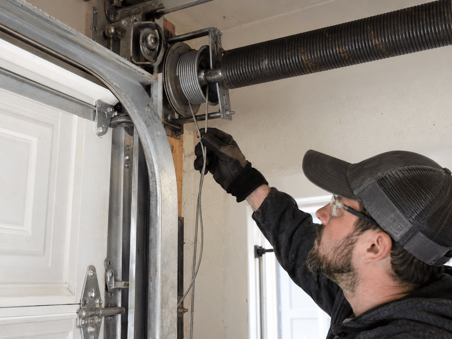 Frayed garage door lift cables in Rosharon TX