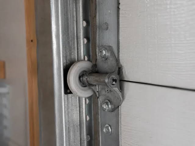 Commercial garage door roller service in Rosharon TX